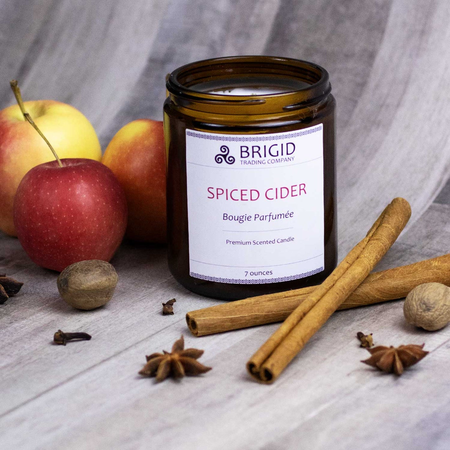 BRIGID Spiced Cider premium scented candle jar with apples and cinnamon