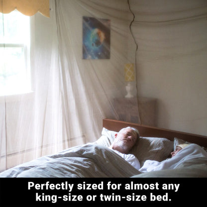 EMF shielding bed canopy with sheer curtains surrounding a bed