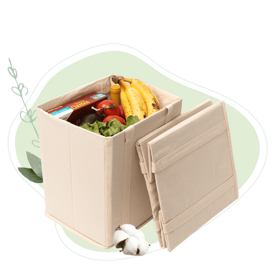 Light beige collapsible grocery shopping bag with food items and foldable handles