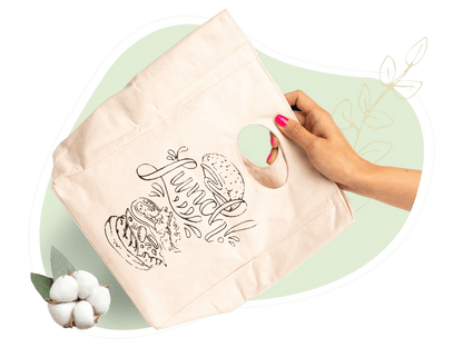 Canvas lunch bag in light canvas with black “Lunch!” print illustration on front