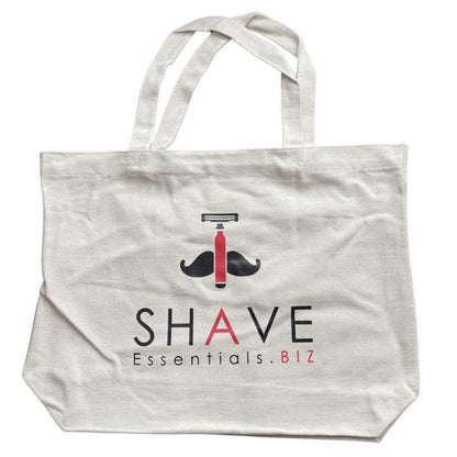 Light canvas tote bag with front graphic and handles, 'SHAVE' text