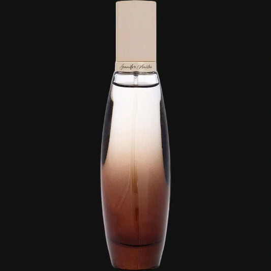 Perfume bottle with cream cap and amber glass, silver collar at neck