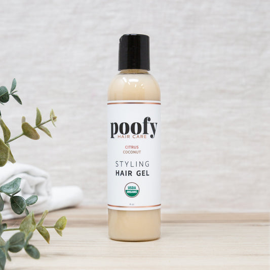 Poofy styling hair gel bottle with black cap, beige bottle, Citrus Coconut label