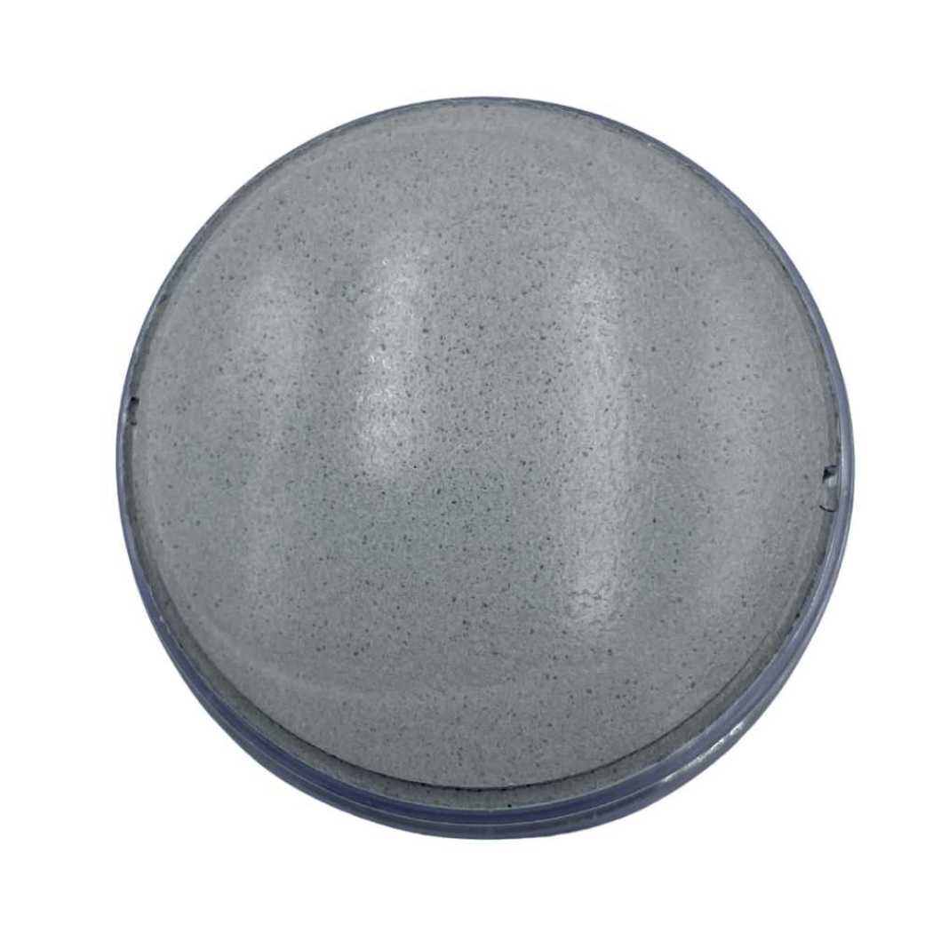 Round clay mask disc in dark gray