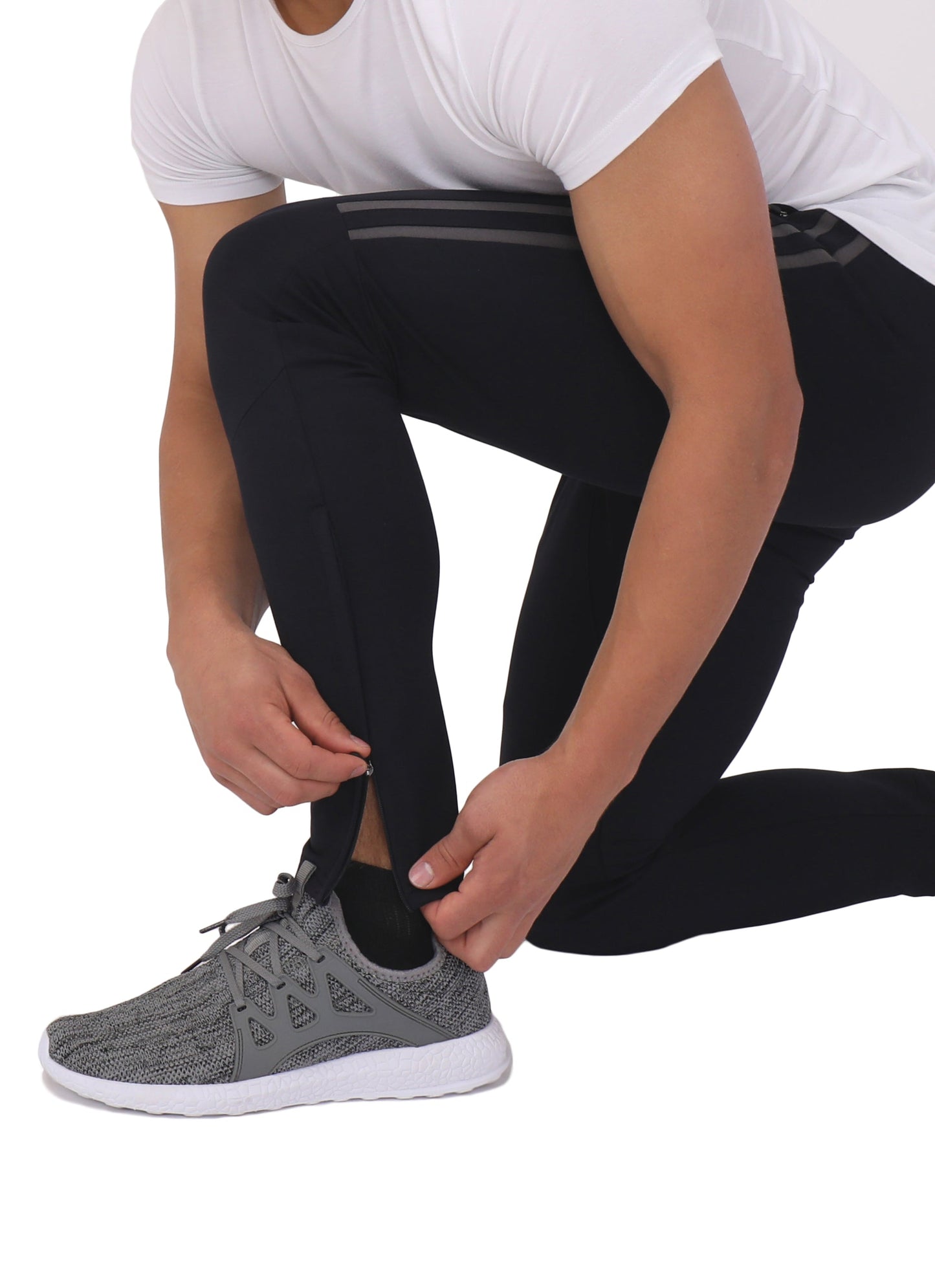 Tall jogger sweatpants in dark color with contrast side stripe and ankle cuffs