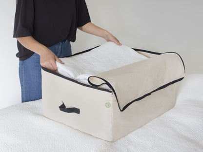 Comforter storage bag, beige fabric with black zipper and side handle loops