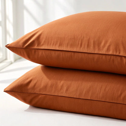 Rust orange bamboo pillowcase with smooth fabric and sewn edge detail