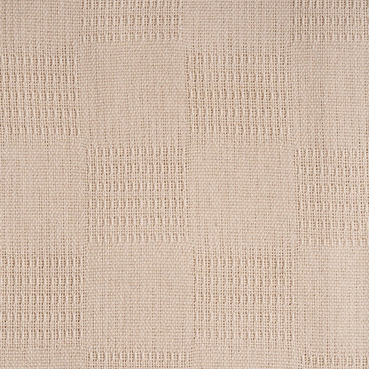 Lightweight cotton blanket fabric close-up, beige textured woven pattern