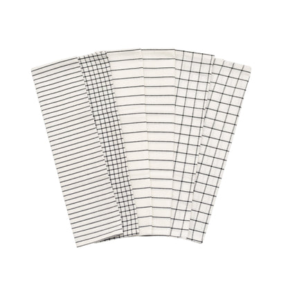 Kitchen towel set: folded striped and check towels in white with black grid lines