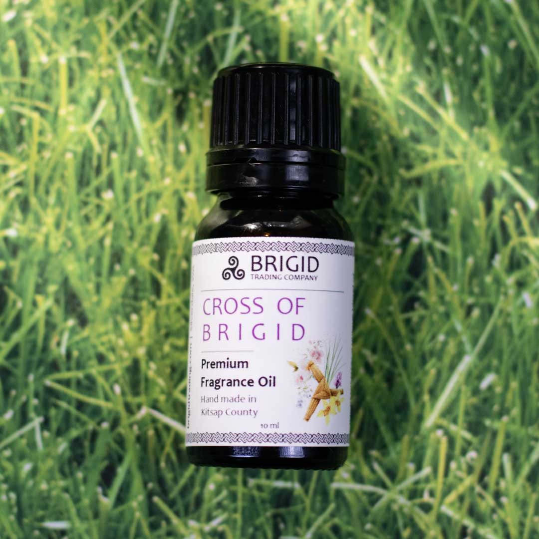 Premium fragrance oil bottle, Cross of Brigid label with black cap and white front tag