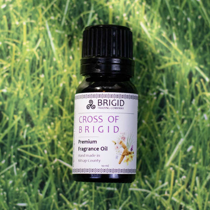 Premium fragrance oil bottle, Cross of Brigid label with black cap and white front tag
