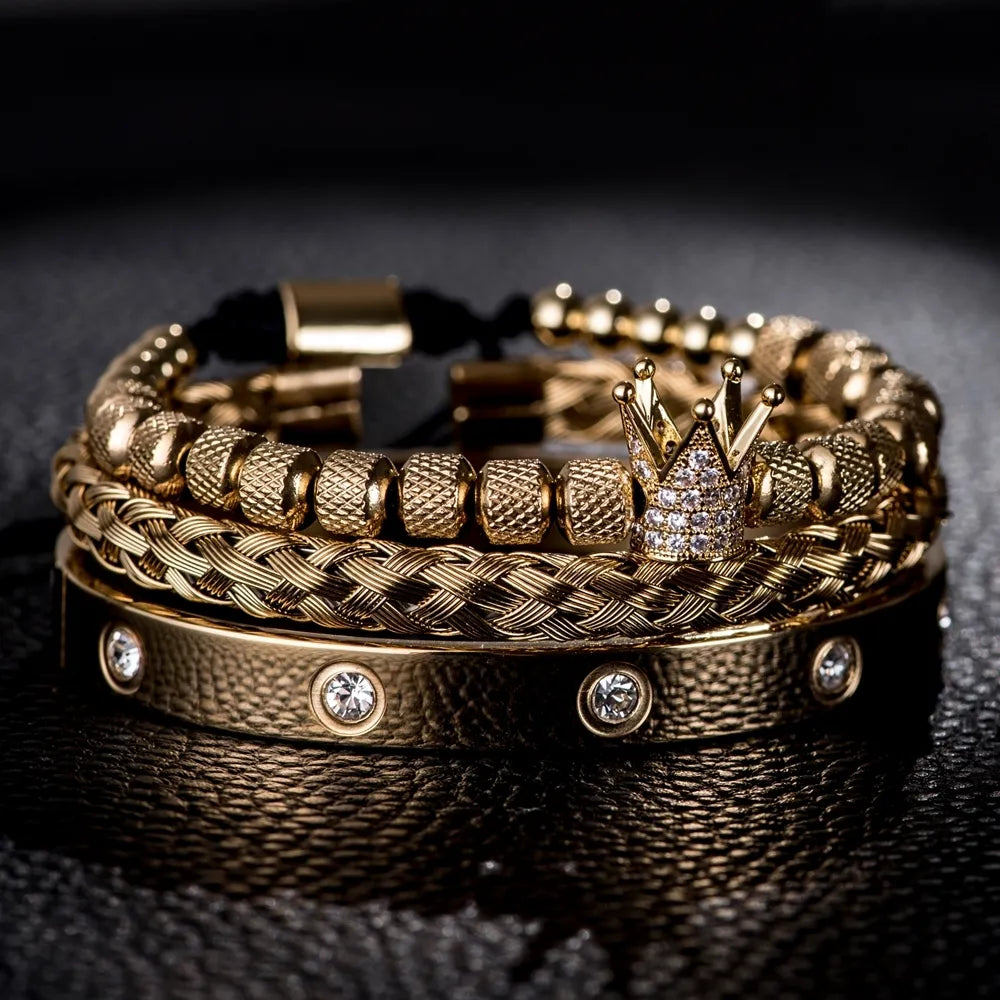 Gold Roman bracelet with crown charm and round diamond-studded links