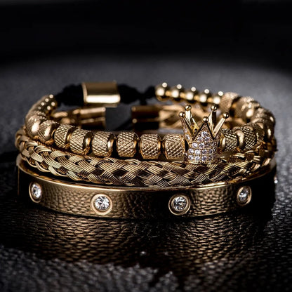 Gold Roman bracelet with crown charm and round diamond-studded links