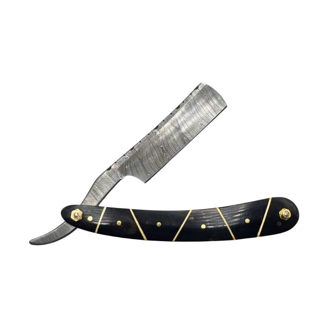 Damascus straight razor with black handle, gold pin and line accents, slim damascus blade