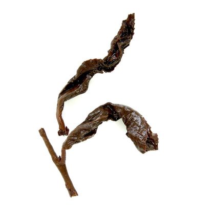 Twisted dark roasted oolong tea leaves