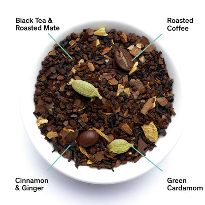 Roasted black tea blend with roasted coffee pieces, cinnamon, ginger, cardamom in bowl
