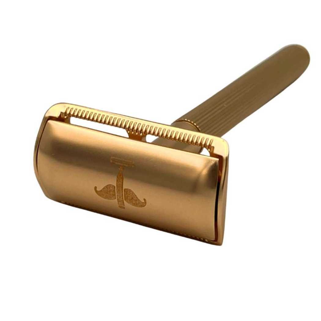 Gold double-sided safety razor head with comb teeth and ridged guard