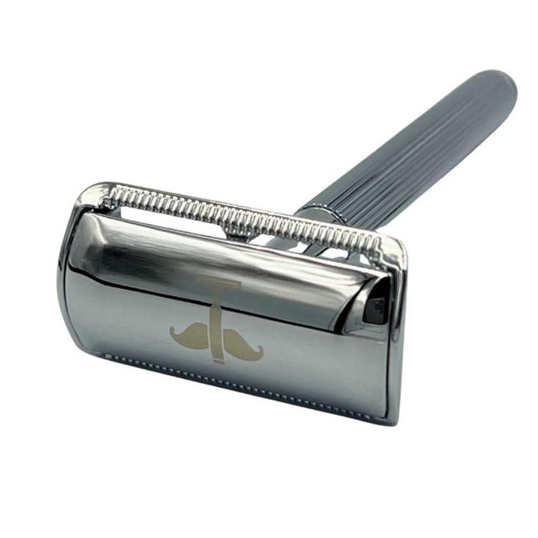 Silver double-sided safety razor head with comb teeth and ridged guard