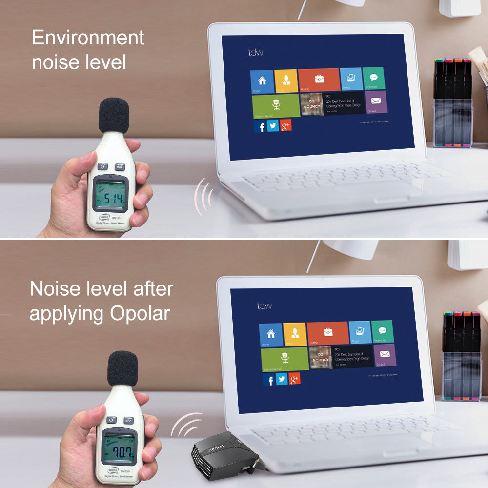 Black laptop fan cooler beside a laptop while a person measures device noise