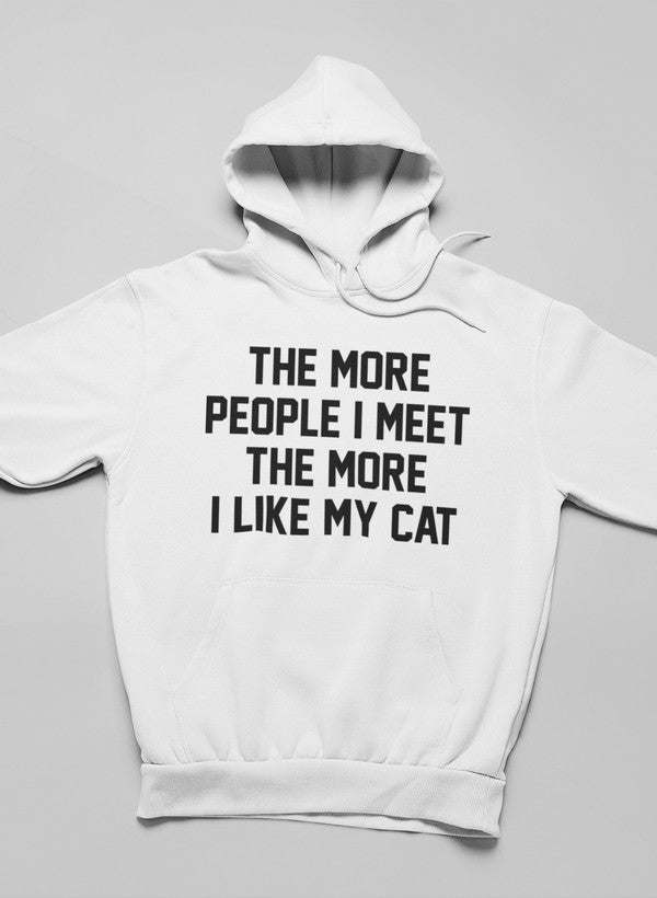 White pullover hoodie with hood up and chest slogan: THE MORE PEOPLE I MEET THE MORE I LIKE MY CAT