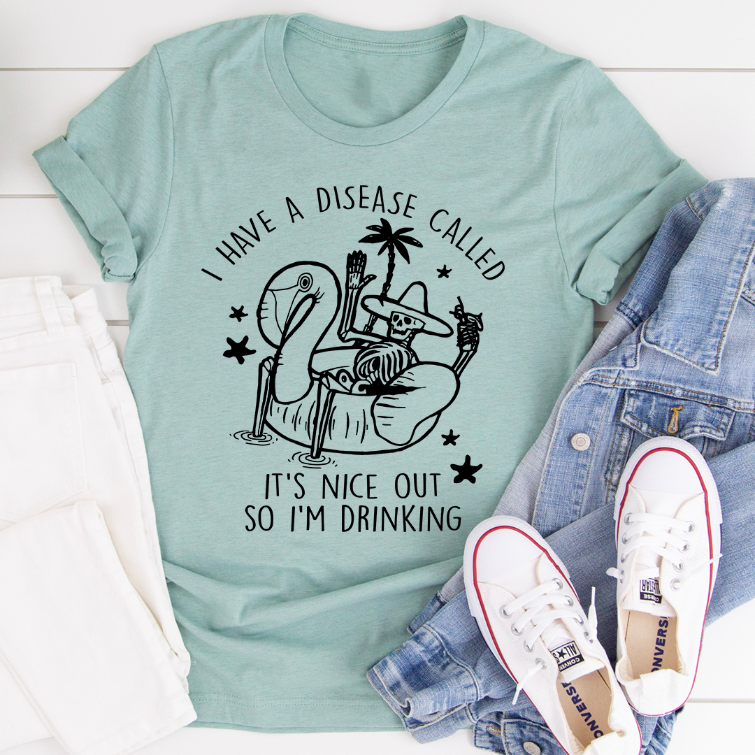 Seafoam green graphic T-shirt with cactus drink illustration and slogan
