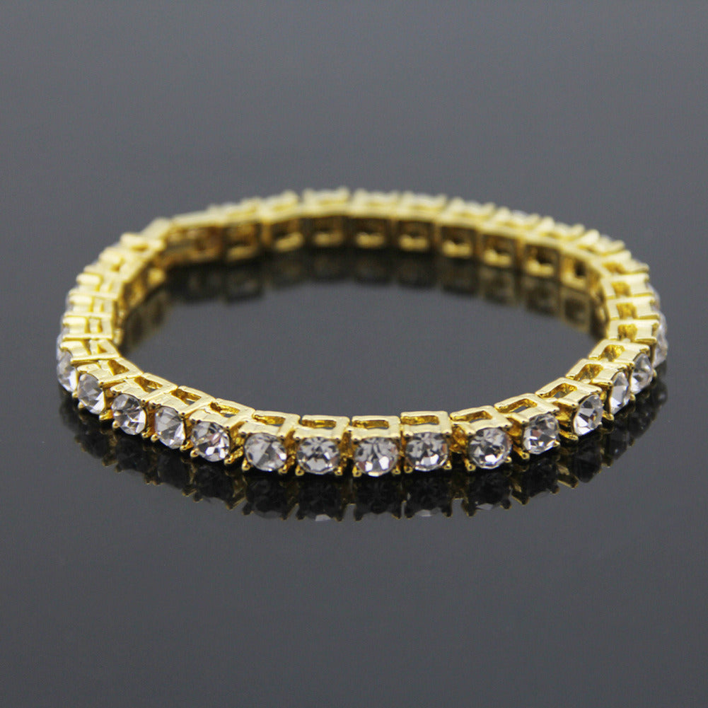 Gold-tone rhinestone link bracelet with clear CZ stones and secure clasp