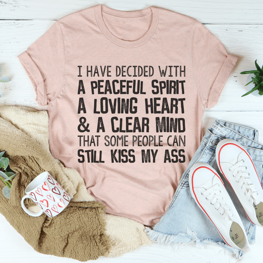 Mauve crewneck graphic T-shirt with black slogan text: I HAVE DECIDED WITH A PEACEFUL SPIRIT