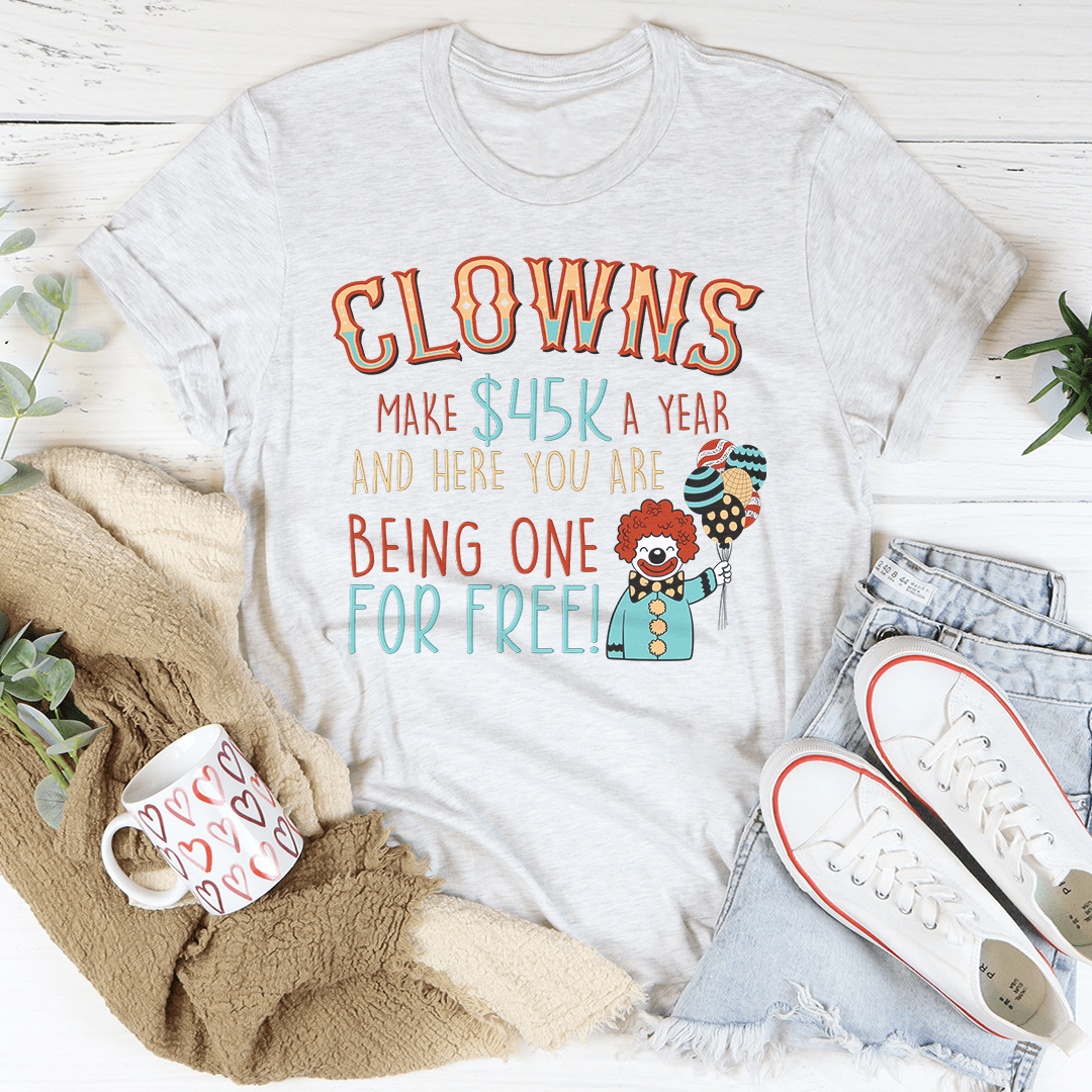 Heather gray T-shirt with colorful clown graphic and “Clowns make 45K a year” text