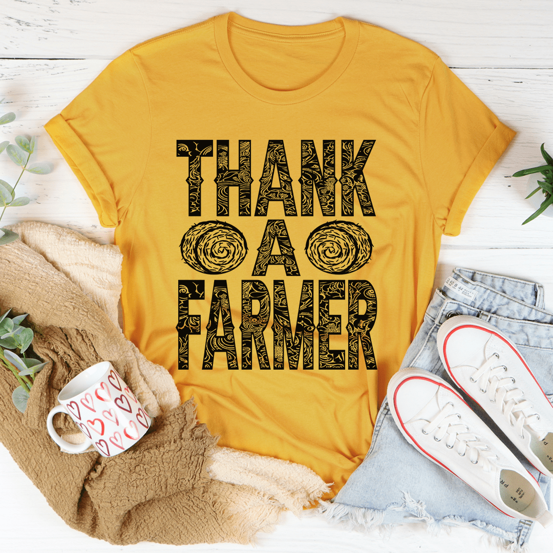 Mustard yellow thank-you farm t-shirt with large 'THANK A FARMER' graphic