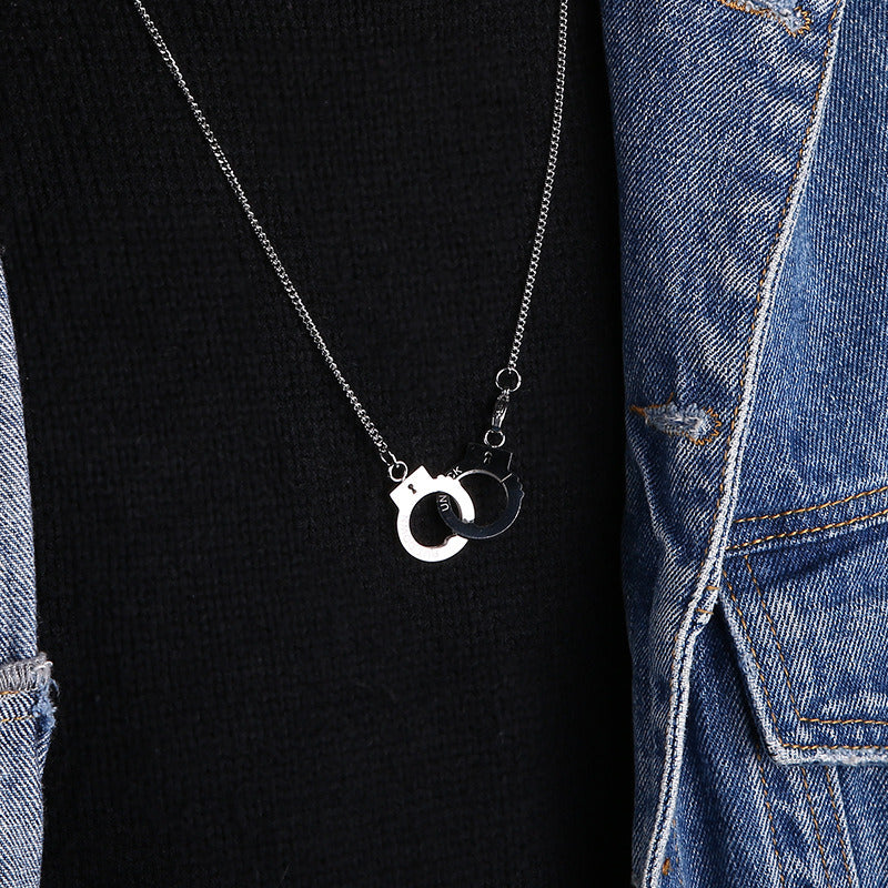 Handcuff pendant necklace with black and silver handcuff charm on chain