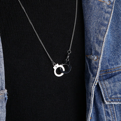 Handcuff pendant necklace with black and silver handcuff charm on chain