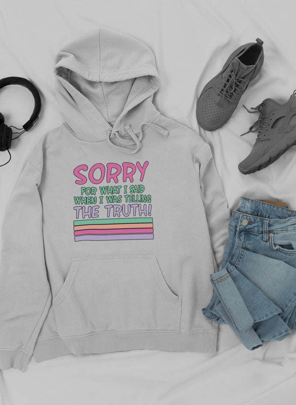 White hoodie with front text graphic, kangaroo pocket, and drawstring hood