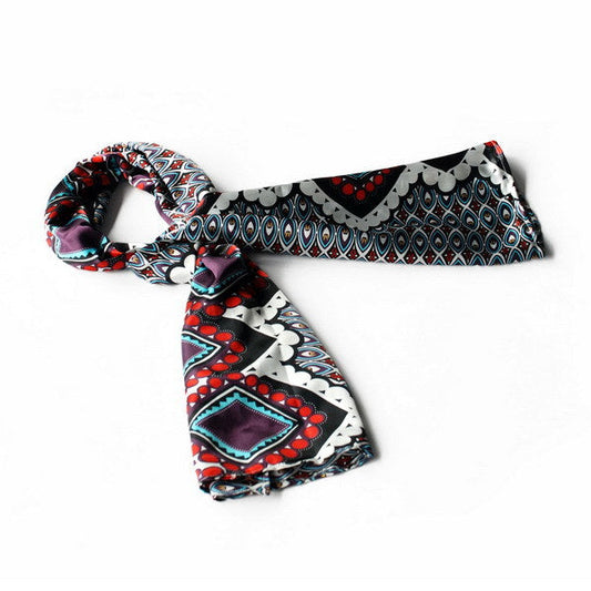 Silky scarf with black, white, red, and purple geometric patterns, small wrap style