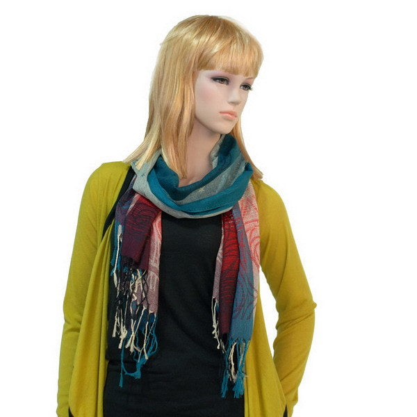 Multicolor pashmina shawl draped on model, teal red and beige with long fringe tassels
