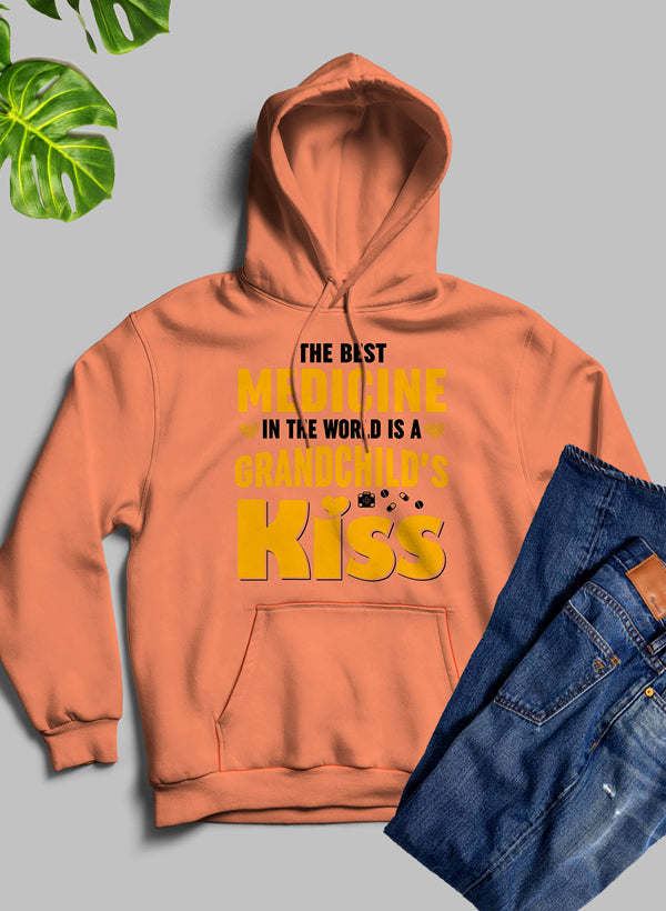 Heather prism peach hoodie with front kangaroo pocket and “Grandchild’s Kiss” graphic