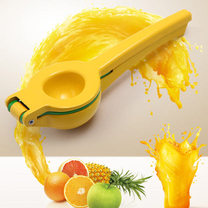 Yellow citrus juicer with round bowl, green cone, and spout releasing juice