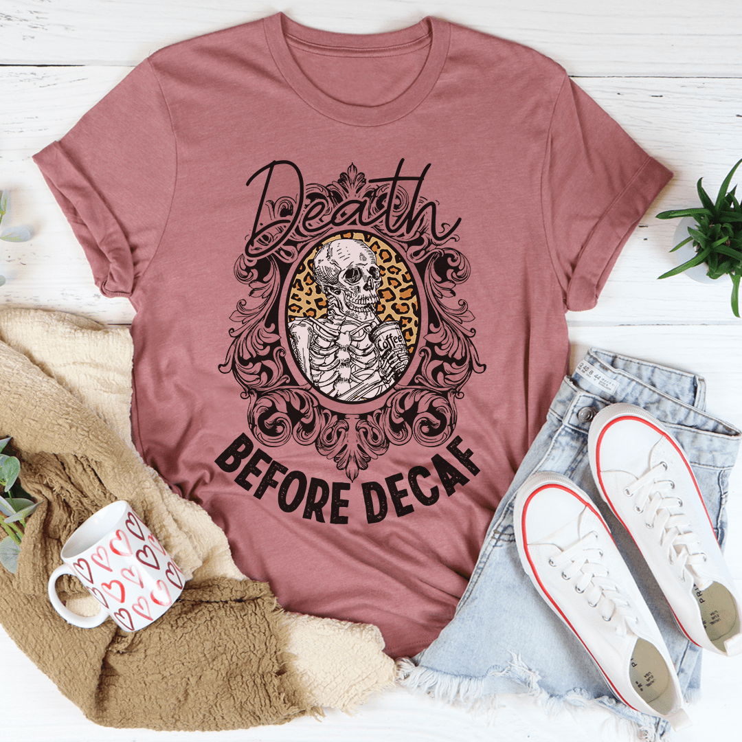 Death Before Decaf T-shirt in mauve, crewneck with ornate skull portrait and “Before Decaf” text.