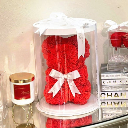Red rose teddy bear gift wrapped in a clear box with white ribbon bow