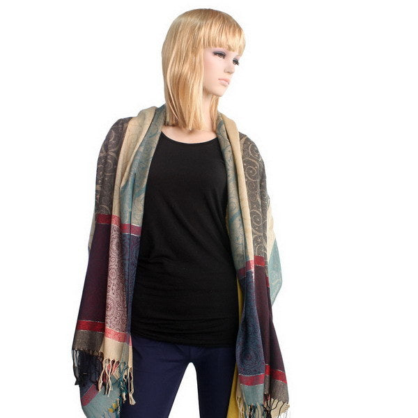 Pashmina shawl draped on model, multicolor plaid panels with fringed trim