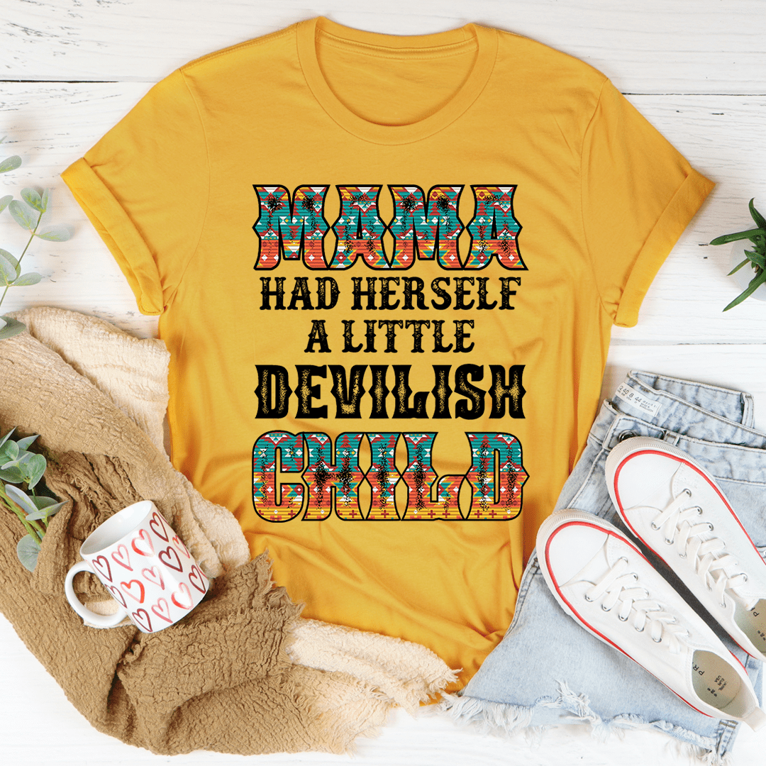 Mustard yellow graphic T-shirt with colorful lettering and gothic 'DEVILISH' text design