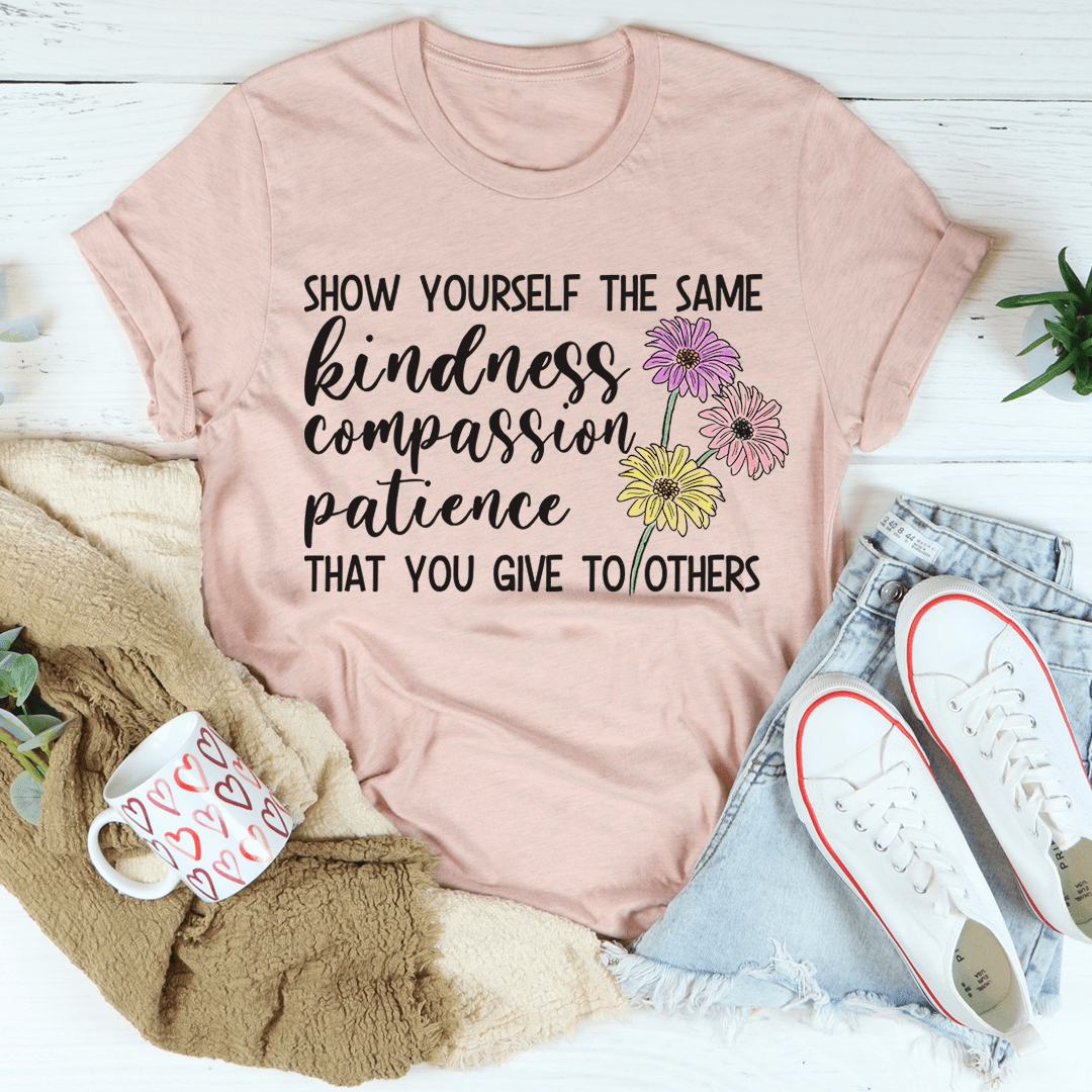 Dusty pink T-shirt with “Show Yourself” quote and flower graphic on the chest