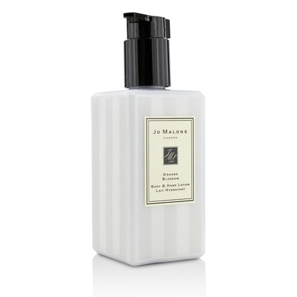 JO MALONE Orange Blossom body and hand lotion bottle with black pump, ridged sides