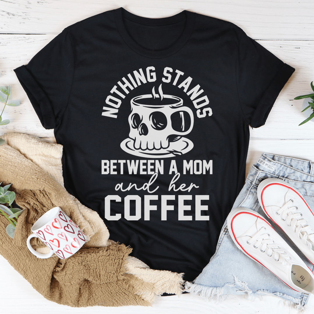Black mom coffee t-shirt with skull graphic and “Between a Mom and her Coffee” text