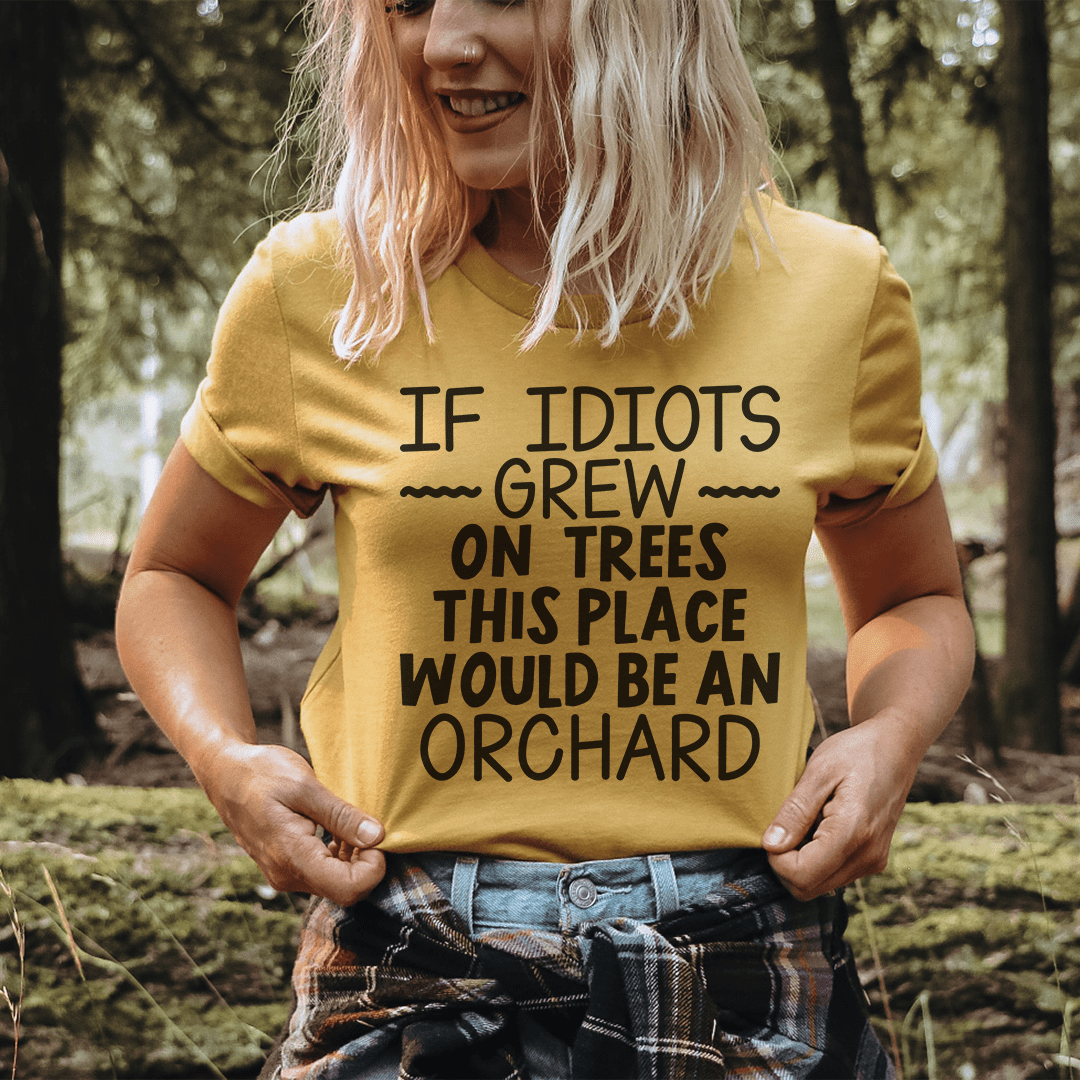 Yellow crewneck T-shirt with bold black slogan text across the chest, short sleeves.