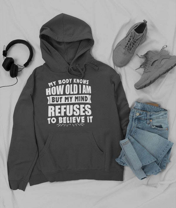 Dark gray pullover hoodie with kangaroo pocket, drawstring, and bold front quote graphic.