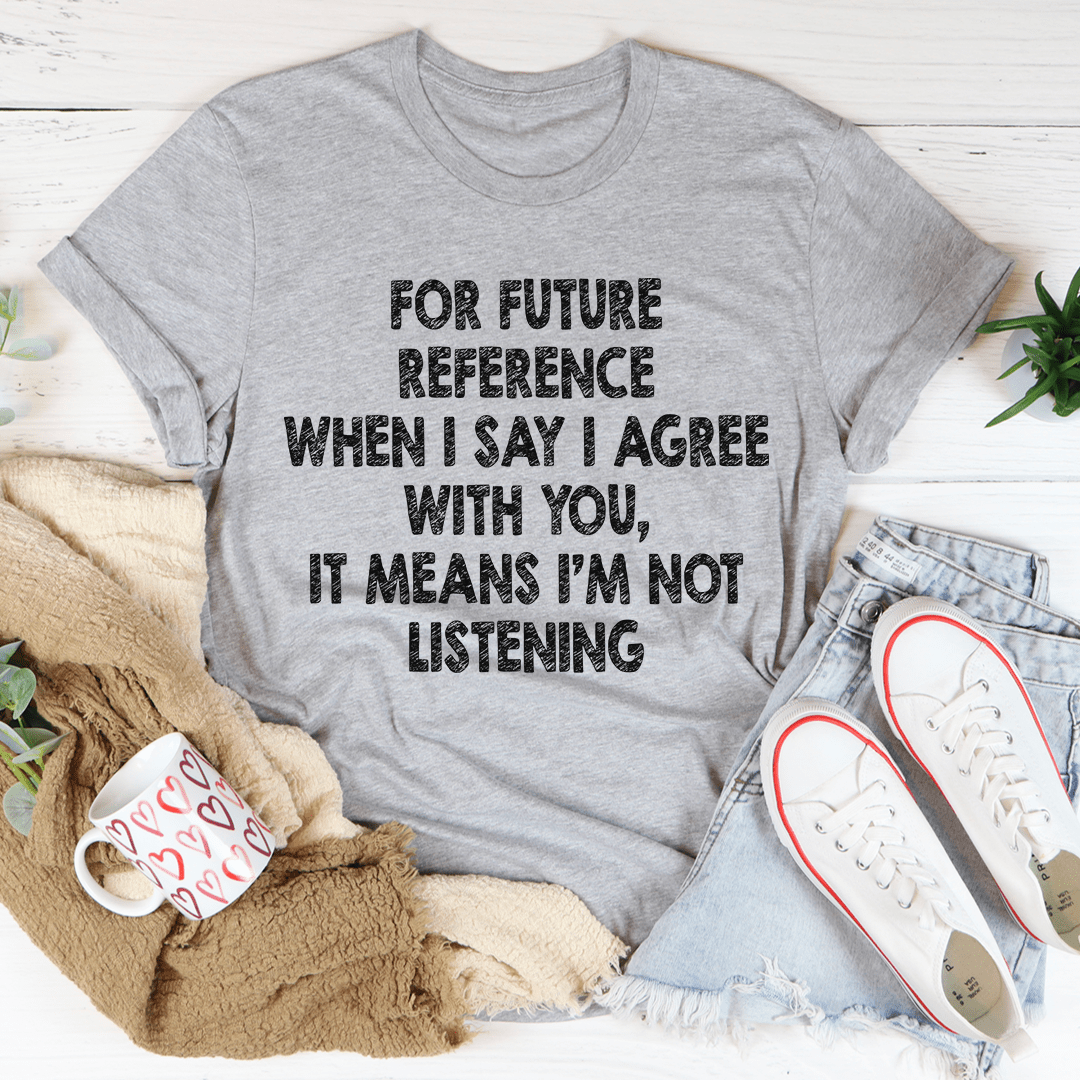 Heather gray T-shirt with distressed black quote graphic: “It means I’m not listening”