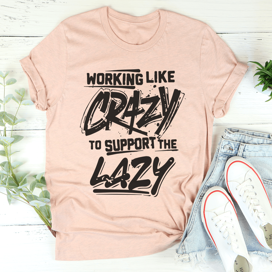 Peach T-shirt with bold 'Working Like' and 'LAZY' graphic text