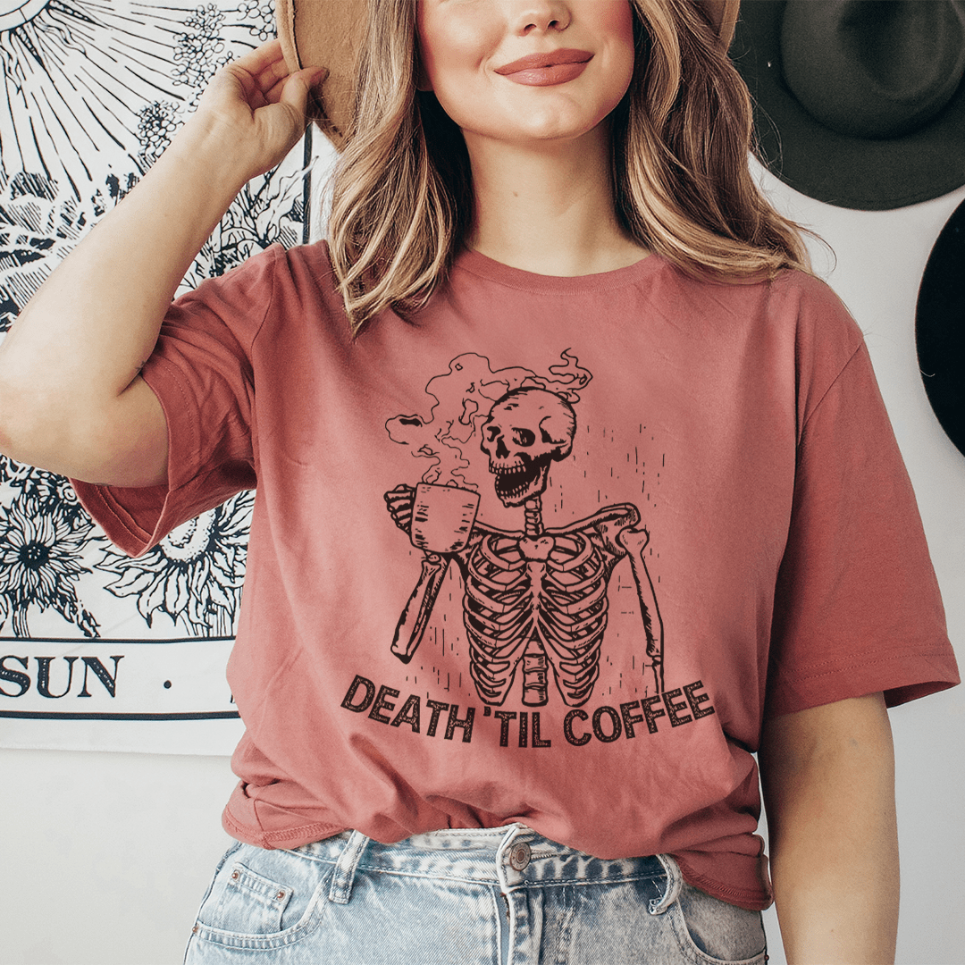 Rose T-shirt with skeleton holding a mug graphic, crew neck short sleeves on model