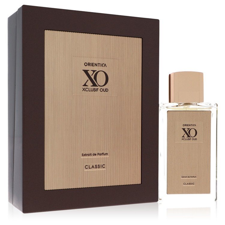 Extrait de parfum set with dark brown box and tan glass bottle with beige label