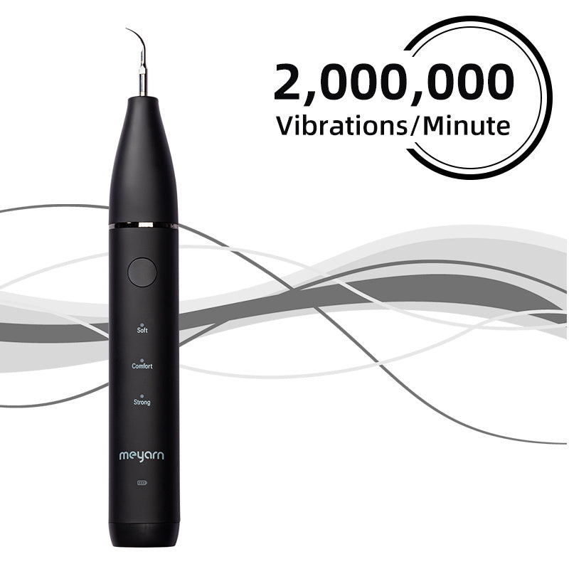 Black electric dental plaque remover with vibration waves graphic and nozzle